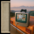 A framed textured canvas print shown next to a retro CRT television sitting on the trunk of an orange car, with a video game controller on top and a blurred outdoor mountain background.