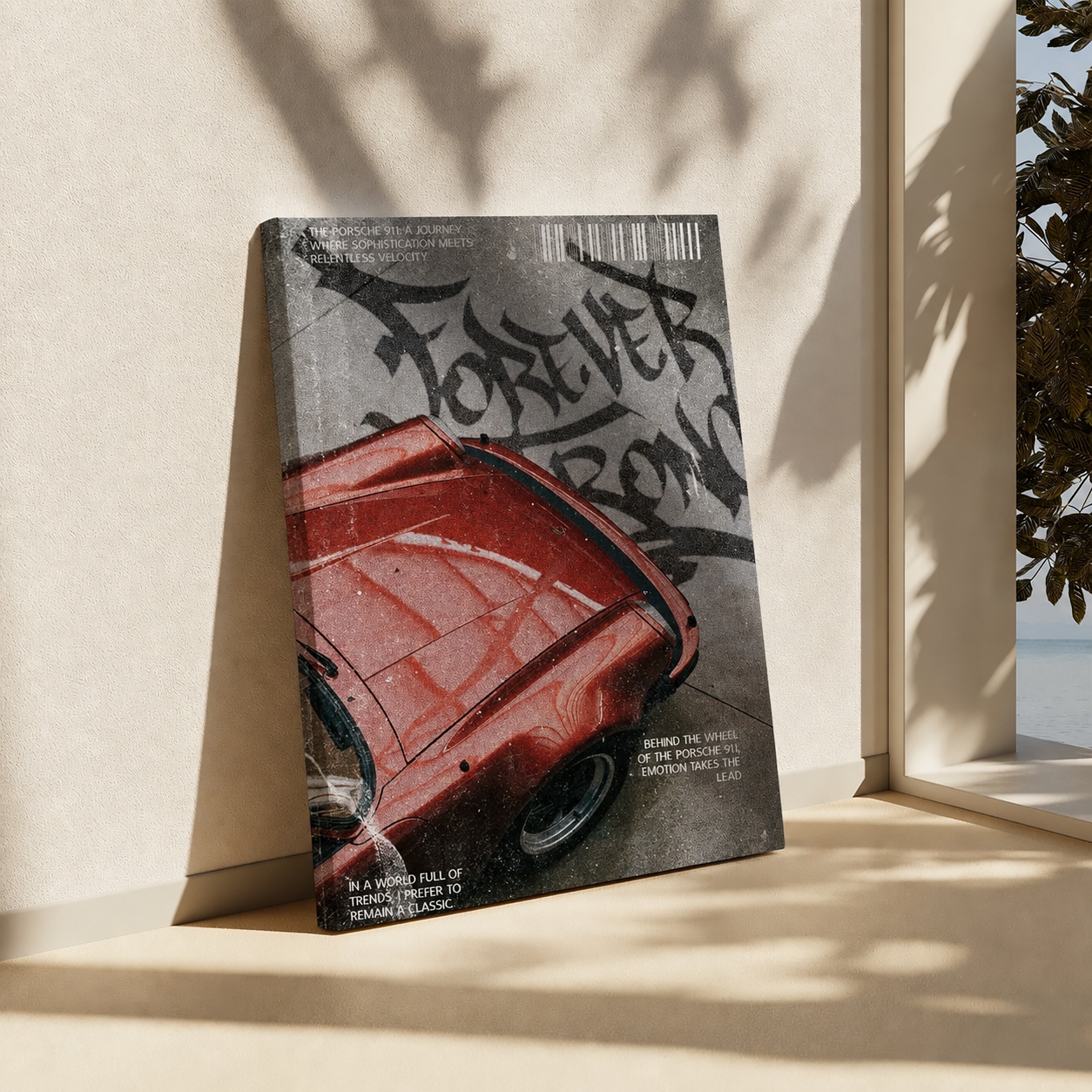 A rectangular art print or poster leaning against a beige wall in a sunlit interior. The print features a distressed gray background with black graffiti-style lettering and a red car illustration.