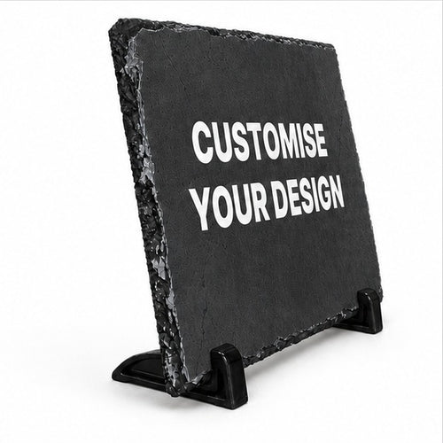 A black slate sign on a small black stand with the words 'CUSTOMISE YOUR DESIGN' in white capital letters, shown on a plain white background.