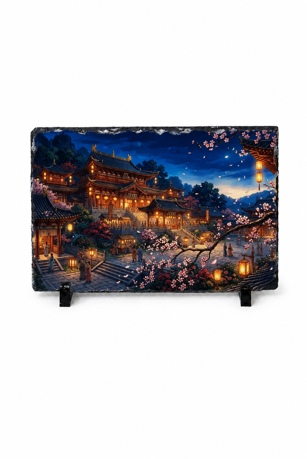 A rectangular decorative plaque or sign with rounded corners, displaying a detailed night scene of an East Asian temple complex with glowing lanterns, cherry blossoms, and a starry sky. The plaque is shown resting on two small black display stands against a plain white background.